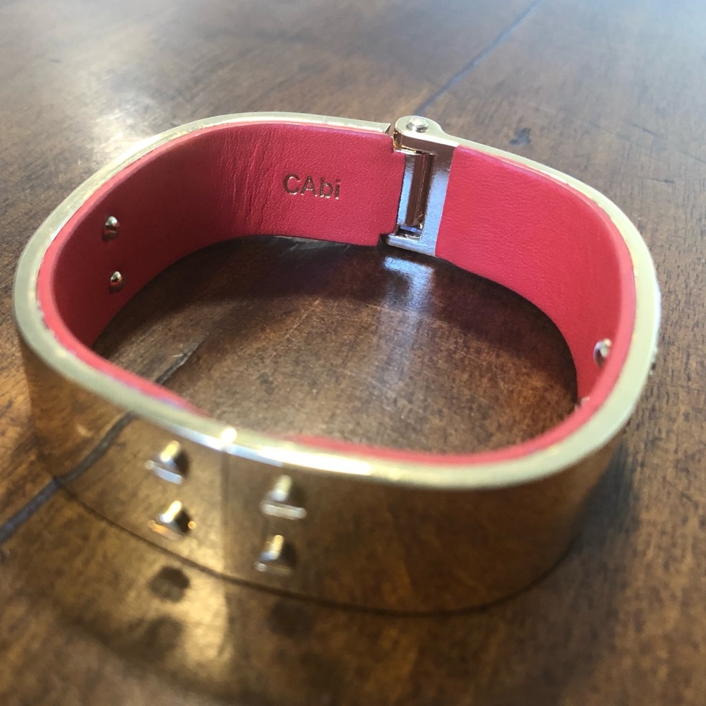 Cabi gold and orange leather hinged cuff bracelet.